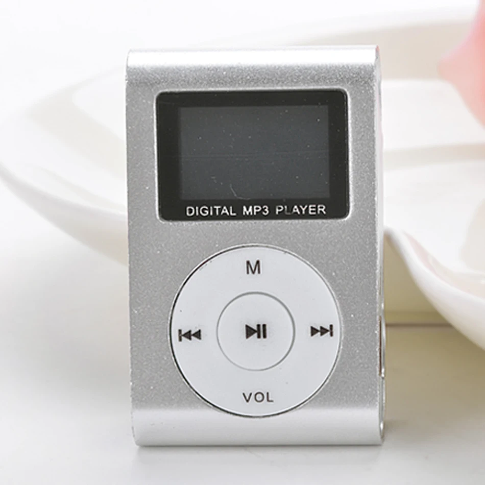 Silver Mini MP3 Player Clip USB FM Radio LCD Screen Support for 32GB