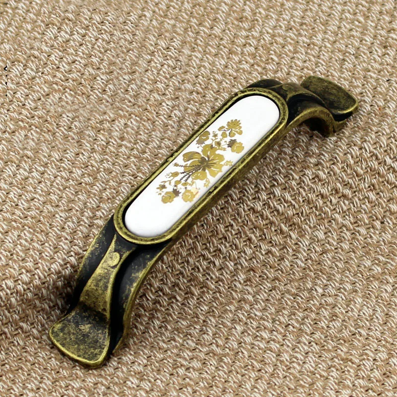 

New Gold Ceramic Handle European Style Fashion Furniture Handle Cabinet Door Wardrobe Drawer Handle(C.C:96mm Length:128mm)