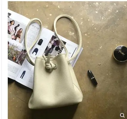 

Spring and summer new niche design leather bucket bag female cowhide handbag