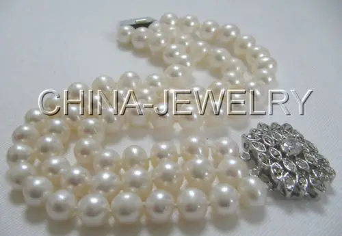 

Wholesale price 16new ^^^^Beautiful 8" 3row 9mm round white freshwater pearl bracelet -white zircon clasp