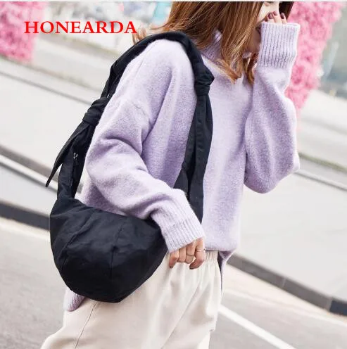 

Fashion canvas shoulder bag with knotted dumplings bag Messenger bag tide handbag