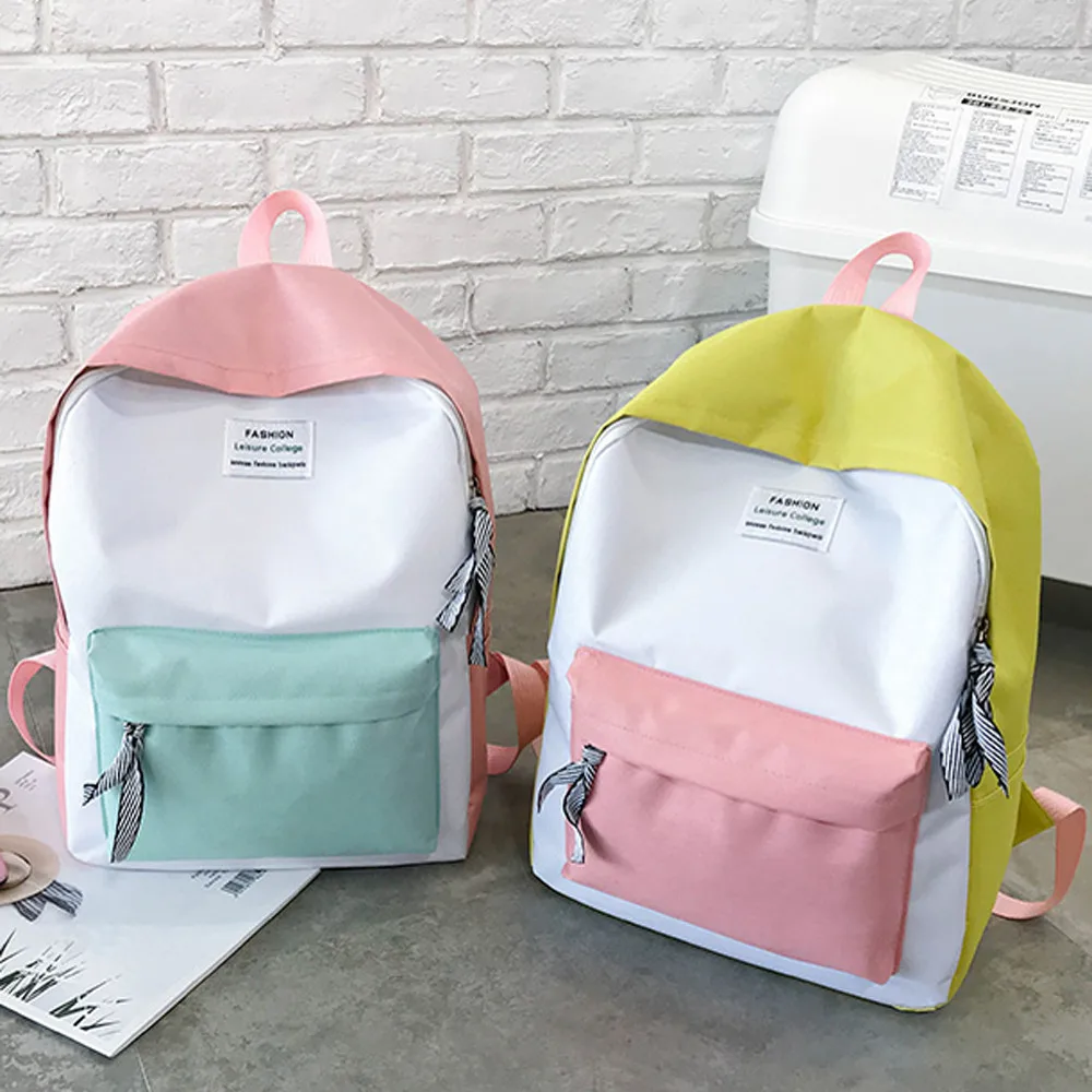 

Fashion ladies backpack leisure college bag Korean version of the couple bag travel hiking bag hit color backpack Dropship Y502