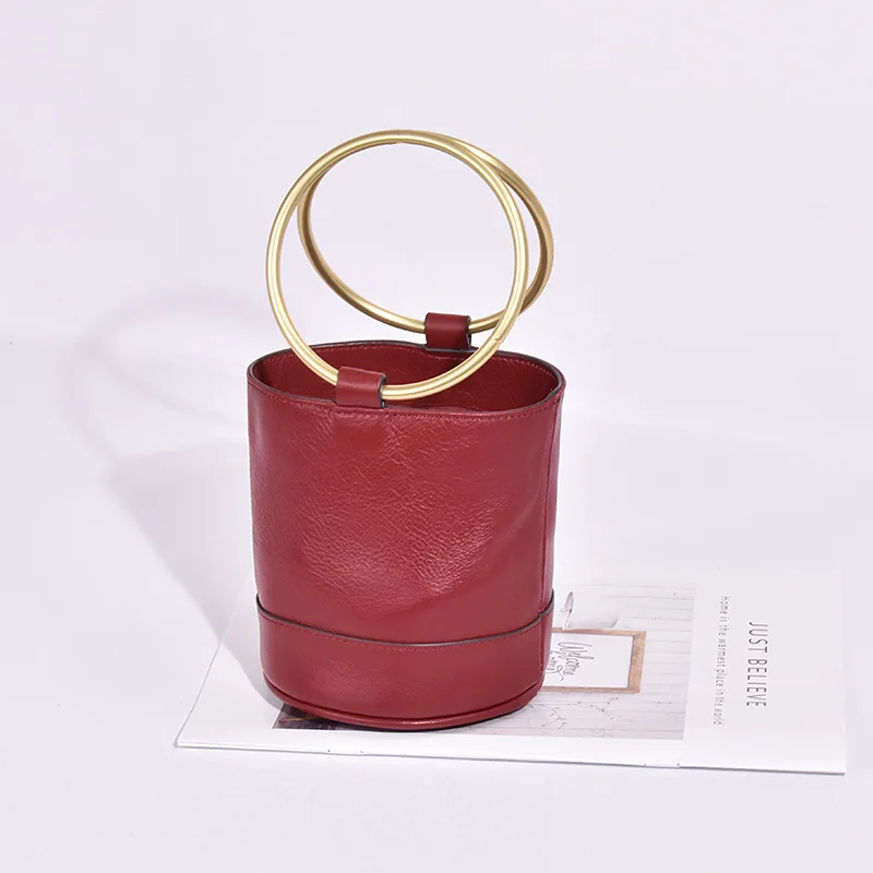 

LOVELY Topest New Pattern Leather Woman Package Bucket Package Head Layer Cowhide Portable Bucket Package Bag Woman