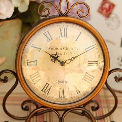 European pastoral style iron antique style desk clock bronze mute table clock study home decoration European pastoral style iron antique style desk clock bronze mute table clock study home decoration