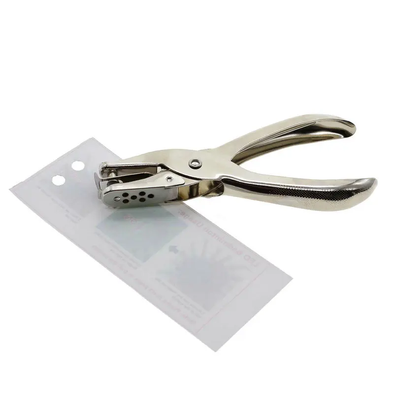 

Silver Metal Single Hole Puncher Hand Paper Punch Single Hole Scrapbooking Tool