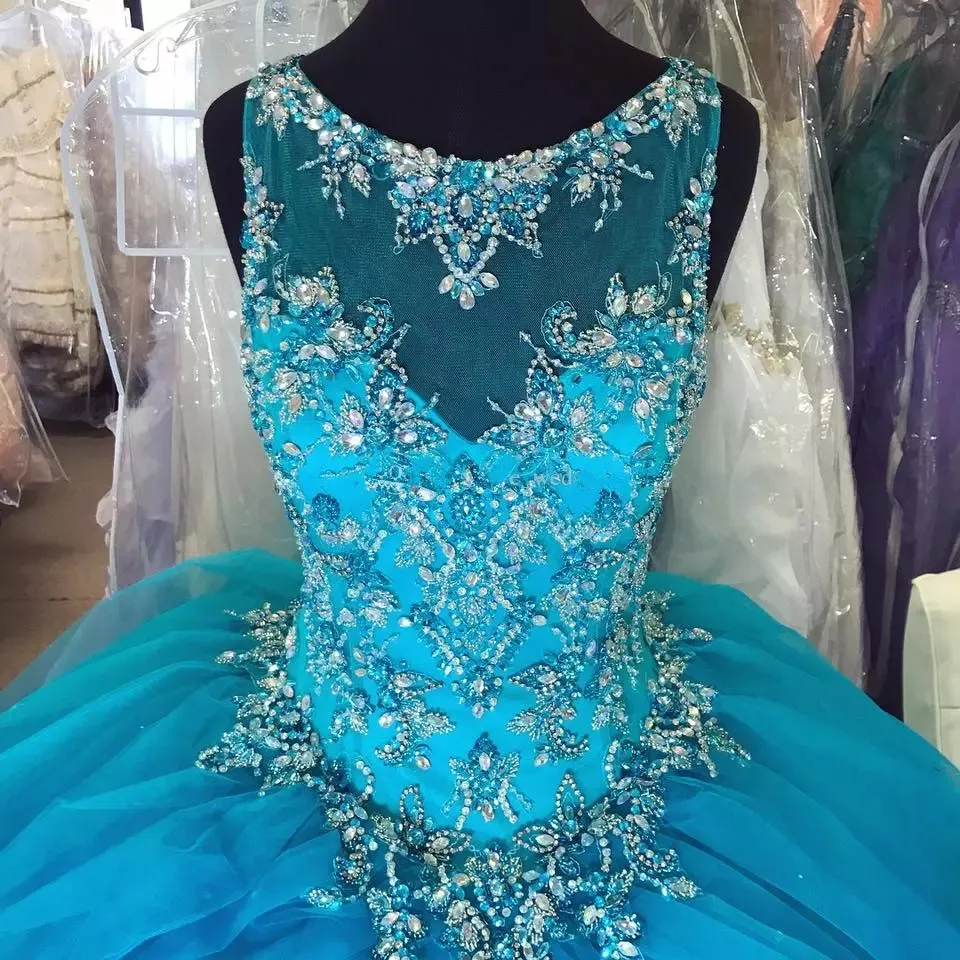 turquoise-blue-tulle-ball-gown-quinceanera-dresses-sheer-neck-crystal-appliques-backless-plus-size-sweet-16-gowns-prom-dresses-lace-up.webp (2)_