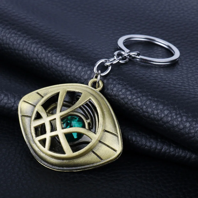 Кулон доктора стрэнджа глаз агамотто. Глаз агамотто марвел. Доктор стрэндж око агамотто. Глаз агамотто марвел. Медальон доктора.