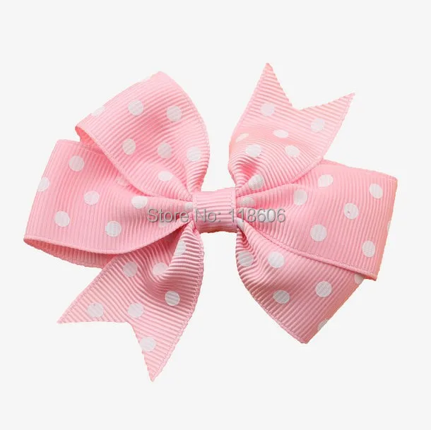 Pink Polka dot pinwheel hair bow.jpg
