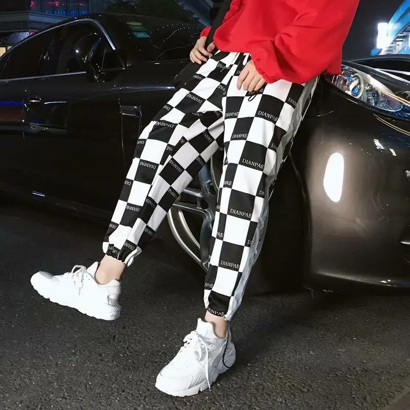 

2019 Plaid Male Reflective ulzzang Sports Pants Division MESSI JURASSI C PARK hip hop pencil pants Guccy Suprem championS tommIS
