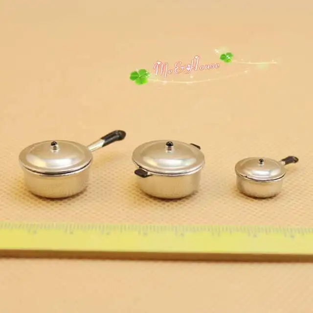 silver pots and pans set