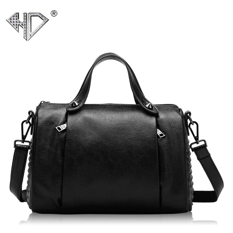 

New leather handbags Europe and the United States wind nails Baotou layer leather pillow bag shoulder portable Messenger bag