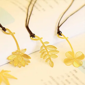 

4pcs/Lot Clover leaf bookmark Metal bookmarks Gold book marks Stationery office School supplies material escolar papeleria