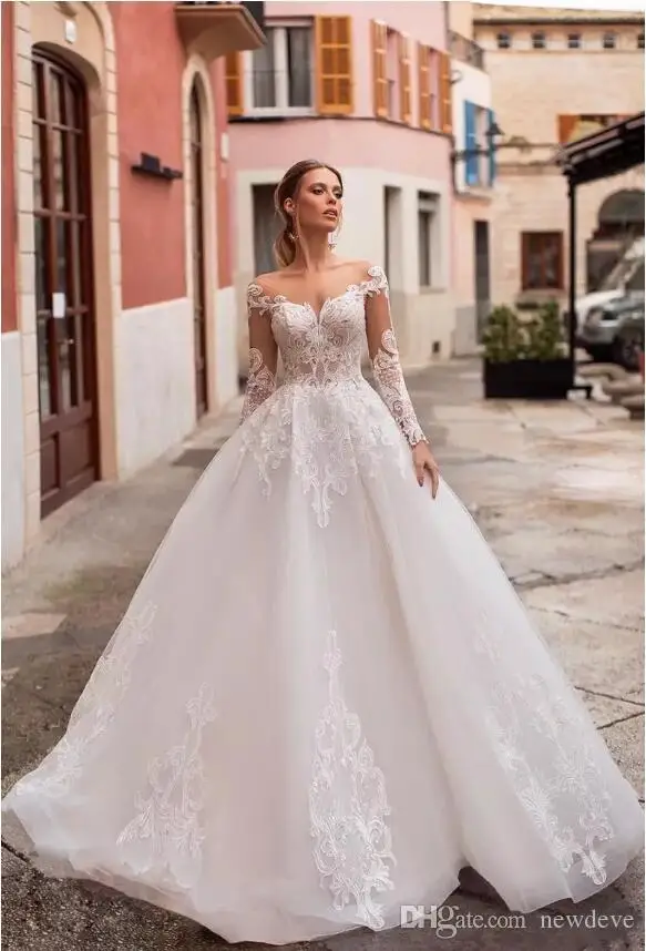 naviblue-latest-princess-wedding-dresses-scoop-neck-long-sleeve-lace-bridal-gowns-saudi-luxurious-custom-made-illusion-a-line-wedding-dress (2)