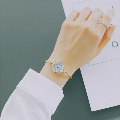 

Korean fashion women's watch student casual quartz watch men and women trend retro belt couple table