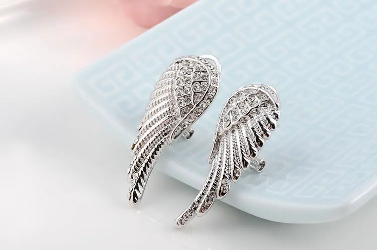 New Arrivals Christmas Gift Fashion Elegant Design Austrian Crystal New Arrivals Christmas Gift Fashion Elegant Design Austrian Crystal Angel Wings Platinum Stud Earrings Women Whole In From Jewelry