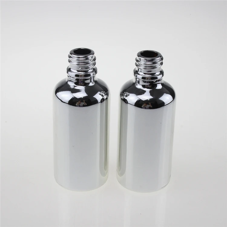 

100PCS hot 50ml glass essential oil bottle with ribbed cap wholesale , empty sub-bottling UV electroplating silver glass bottle