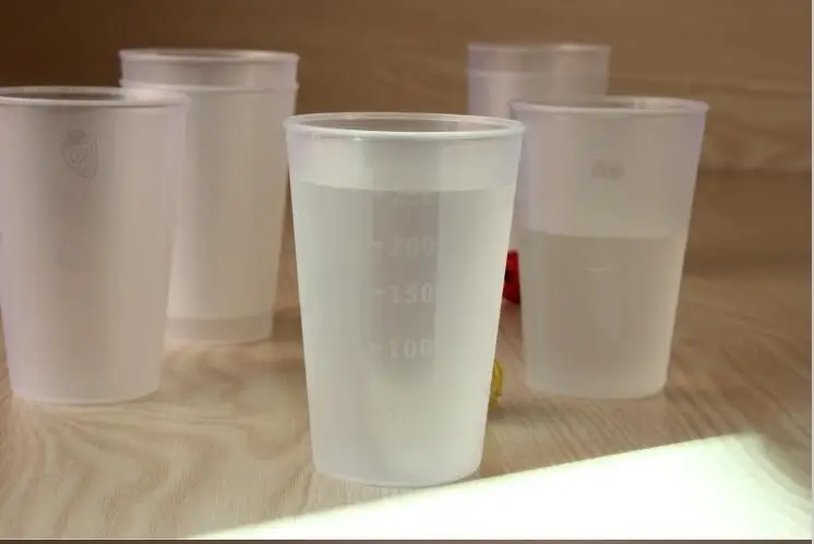 

transparent fruit design Matte surface juice beer scales Plastic Measuring cups 250 ml odorless Factory direct sale