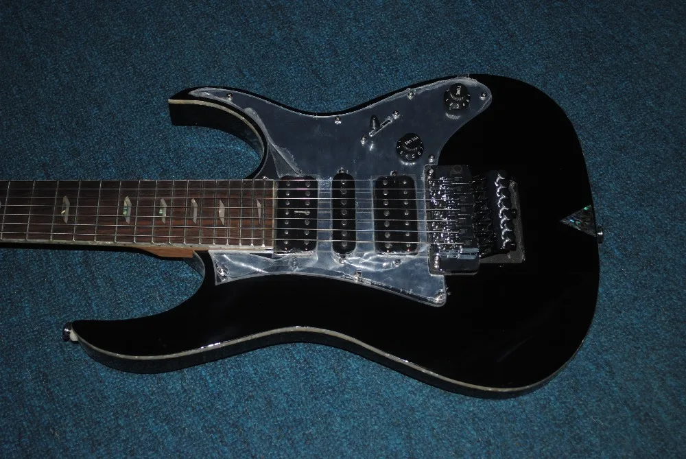 

full black 7 string electric guitar