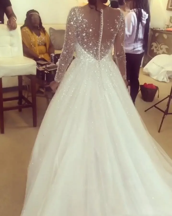 sheer-jewel-neck-a-line-boho-wedding-dresses-with-long-sleeves-beaded-crystals-bridal-dresses-hollow-zipper-bac-wedding-gowns-for-brides