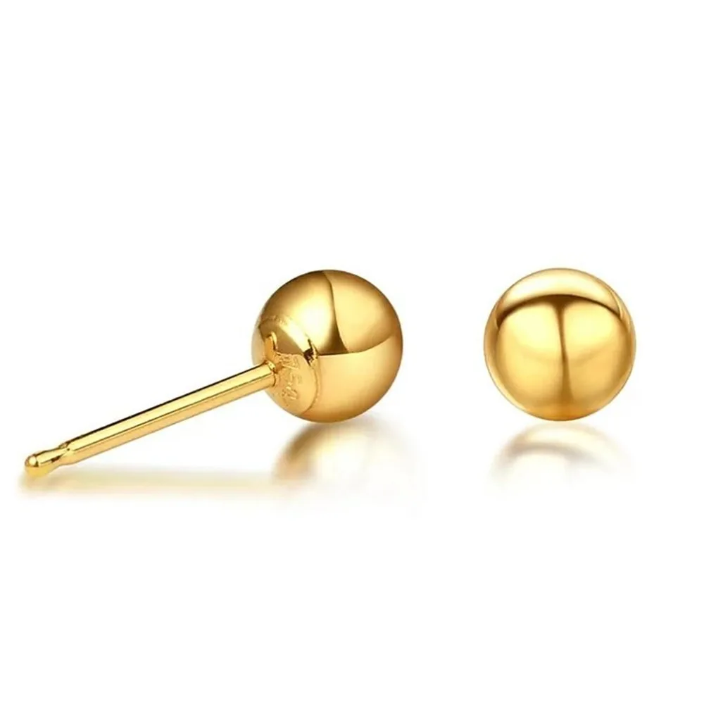 children earing gold ball studs