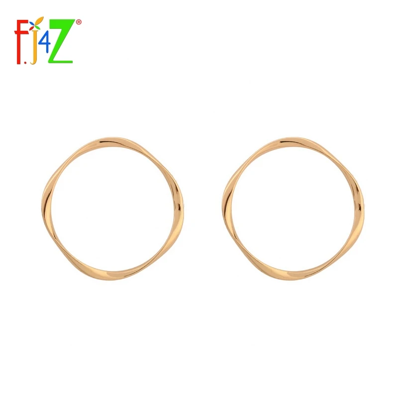 

F.J4Z Most Popular Personality Simple Female Earrings Hot Fashion Geometry Circle Alloy Stud Earrings For Women Party Show