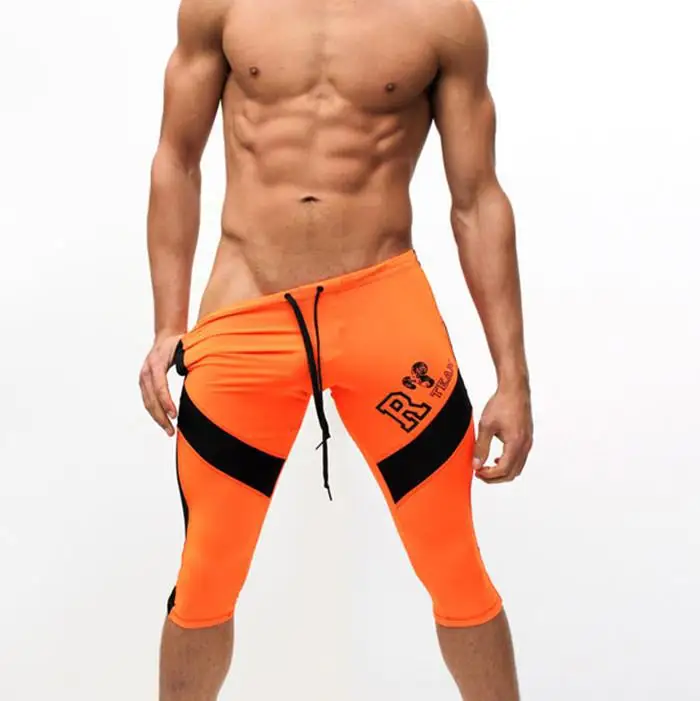 JIGERJOGER новые кислотные зеленые оранжевые мужские спортивные Леггинсы для фитнеса, Капри, шорты, обтягивающие быстросохнущие Стрейчевые плавки, спортивные штаны