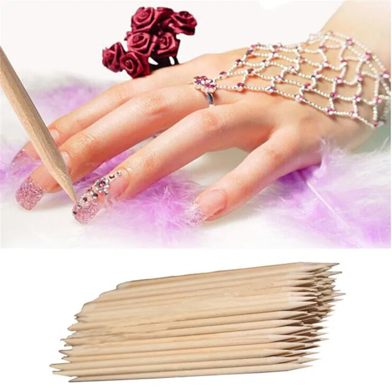 

100Pcs Nail Art Orange Wood Stick Cuticle Pusher Remover Pedicure Manicure Tool It is Double Ended Orange Weed Stick Tip Anne