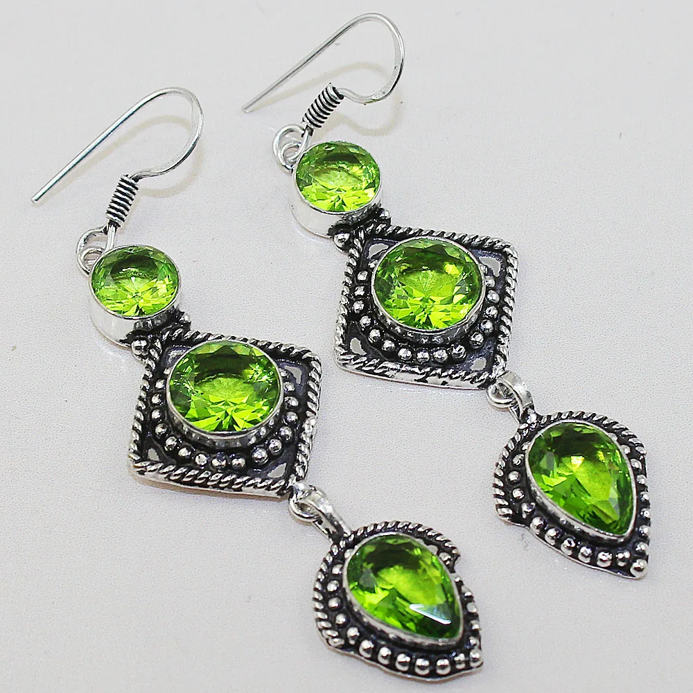

Peridot Earring Silver Overlay over Copper ,73 mm, E0725