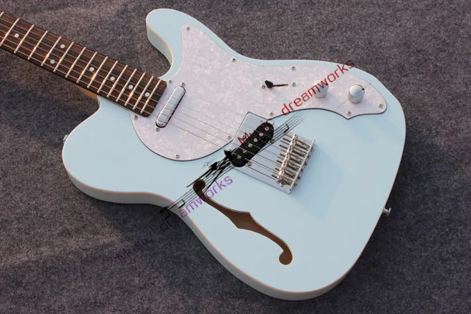 

China firehawk electric guitar, F holes.Light color blue.Half hollow guitar maple neck Free shipping