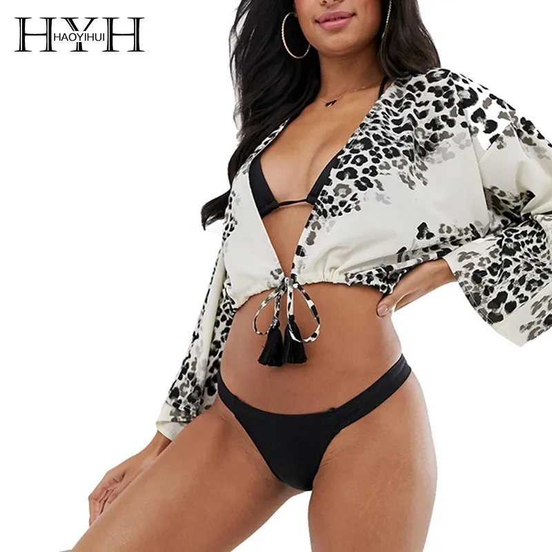 

HYH Haoyihui 2019 Hot Summer Sexy Lady Pattern Print Deep V-neck Blouse Beach Style Loose Flare Sleeve Short Lace Up Coat