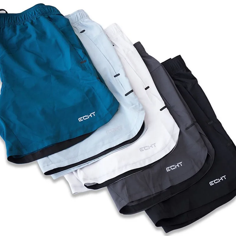 Vente Nouveau short de sport décontracté pour hommes avec poches vêtements de musculation à séchage rapide Fitness entraînement de marche survêtement short de survêtement