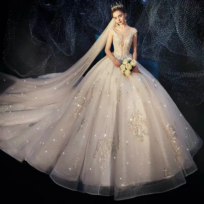 

Amanda Design Cap Sleeve Lace Appliques Shiny Ball Gown Low Cut Wedding Dress