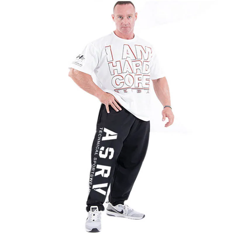 رجل ركض سراويل تقليدية اللياقة البدنية الرجال الرياضية رياضية القيعان نحيل Sweatpants بنطلون أسود صالات رياضية عداء ببطء السراويل الترنك