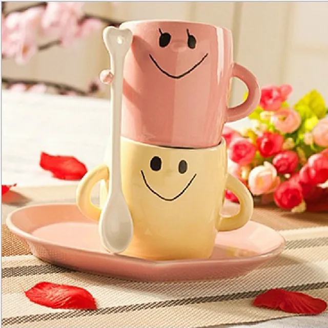 cute couple shaking hands with ceramic cups smiling face couple