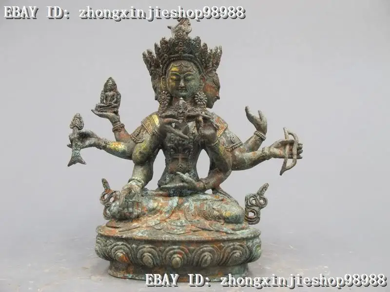 

Do old retro antique Retro bronze factory outlets Folk Temple Bronze gild 3-Head 8-armed enforcement Kwan-Yin Buddha statue