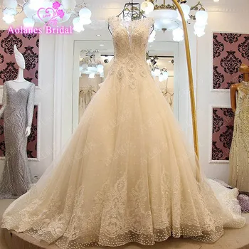 

Luxury Full Appliques Bow Beaded Pearls Wedding Dress Sleeveless A Line 2017 Scoop Cathedral Train Wedding Dresses Real Photo