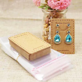 

Cute smiling jewelery package & earring display card kraft/white drop earring products decorative card 100pcs+100 plastic bag