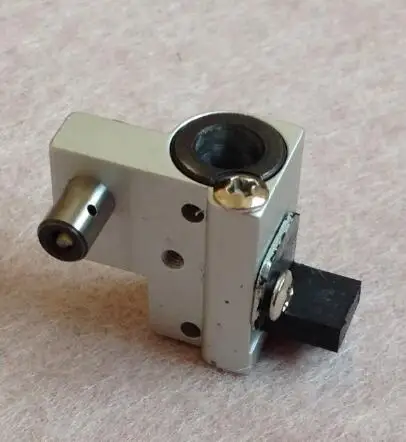 

Tajima and Chinese embroidery machine spare parts - Muffler / Needle bar drive reciprocator assembly
