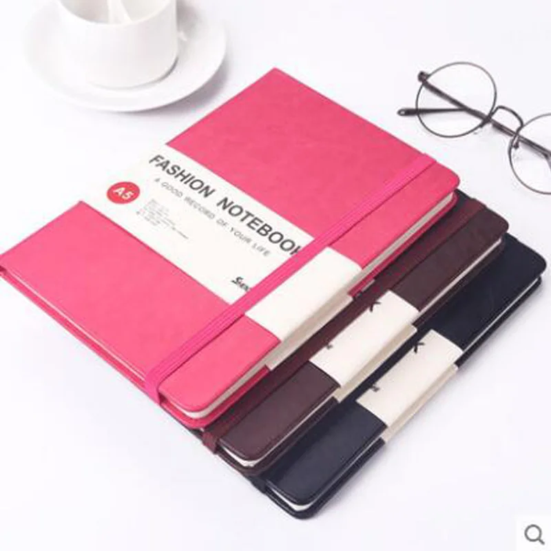 

Creative notebook stationery with thick leather bound journal