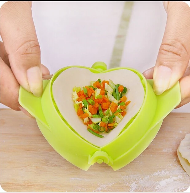 

Food Dumplings modelling tools Kitchen Magic Creative Manual Pack Machine Food-grade Plastic Pinch Color Random hot sale