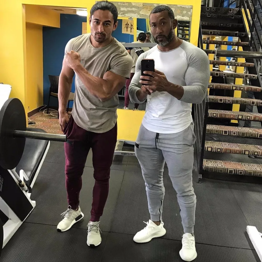 

2019 autumn new Men Fitness Sweatpants male gyms Bodybuilding workout cotton trousers Casual Joggers sportswear Pencil pants