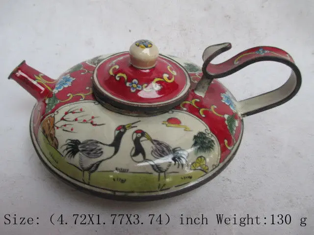 

Ancient Chinese cloisonne hip flask. A pair of cranes