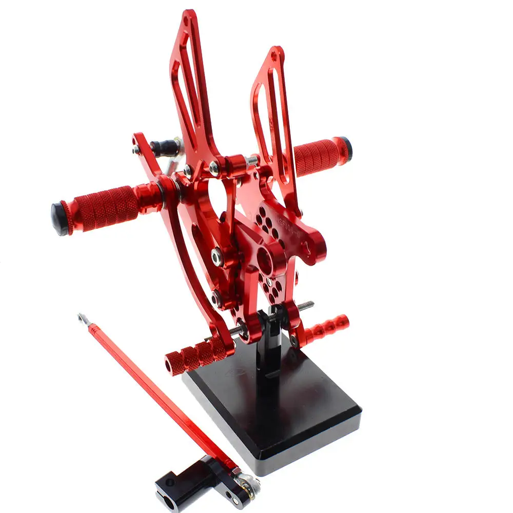 

Red/Gray/Black CNC Rearsets Rear Set Moto Adjustable Foot Stakes Pegs Pedal for Honda NSF100/NSR50 CBR150 CBR150R CBR125 CBR300