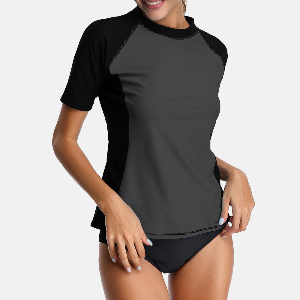 Charmo النساء قصيرة الأكمام طفح الحرس قمصان Rashguard ملابس تصفح أعلى UPF 50 + تشغيل قميص ركوب الدراجات قميص ملابس السباحة بدلة ركوب الأمواج