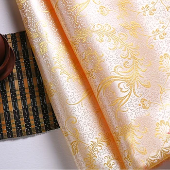 

High quality brocade jacquard polyester white background golden Phoenix Tail fabric for patchwork tissue women dress by 100x90