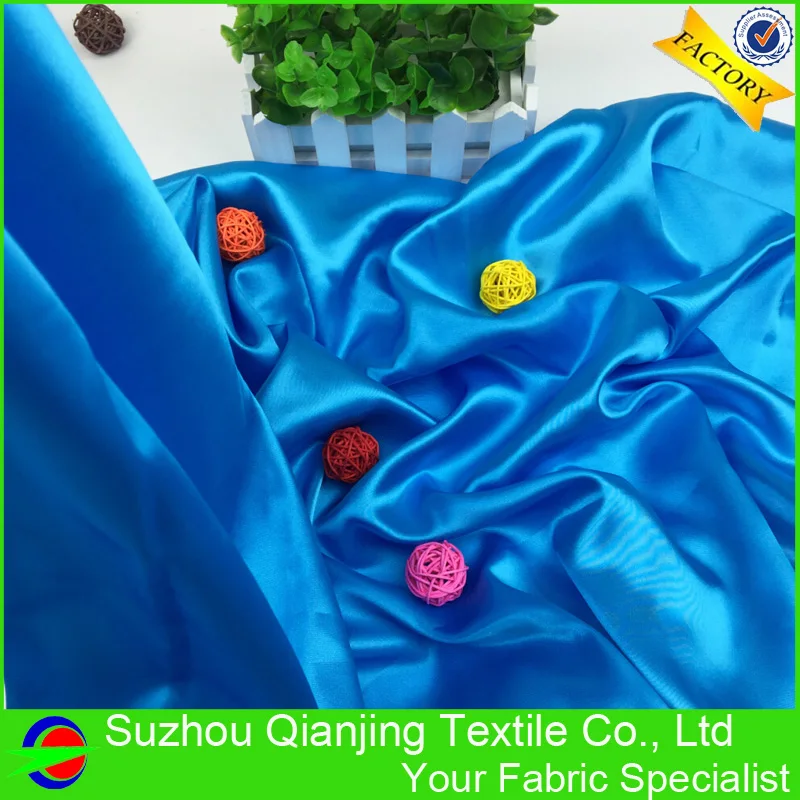 

Shiny Smooth Soft Acid Blue Polyester Satin Fabric High Quality For Dress Lining Decoration