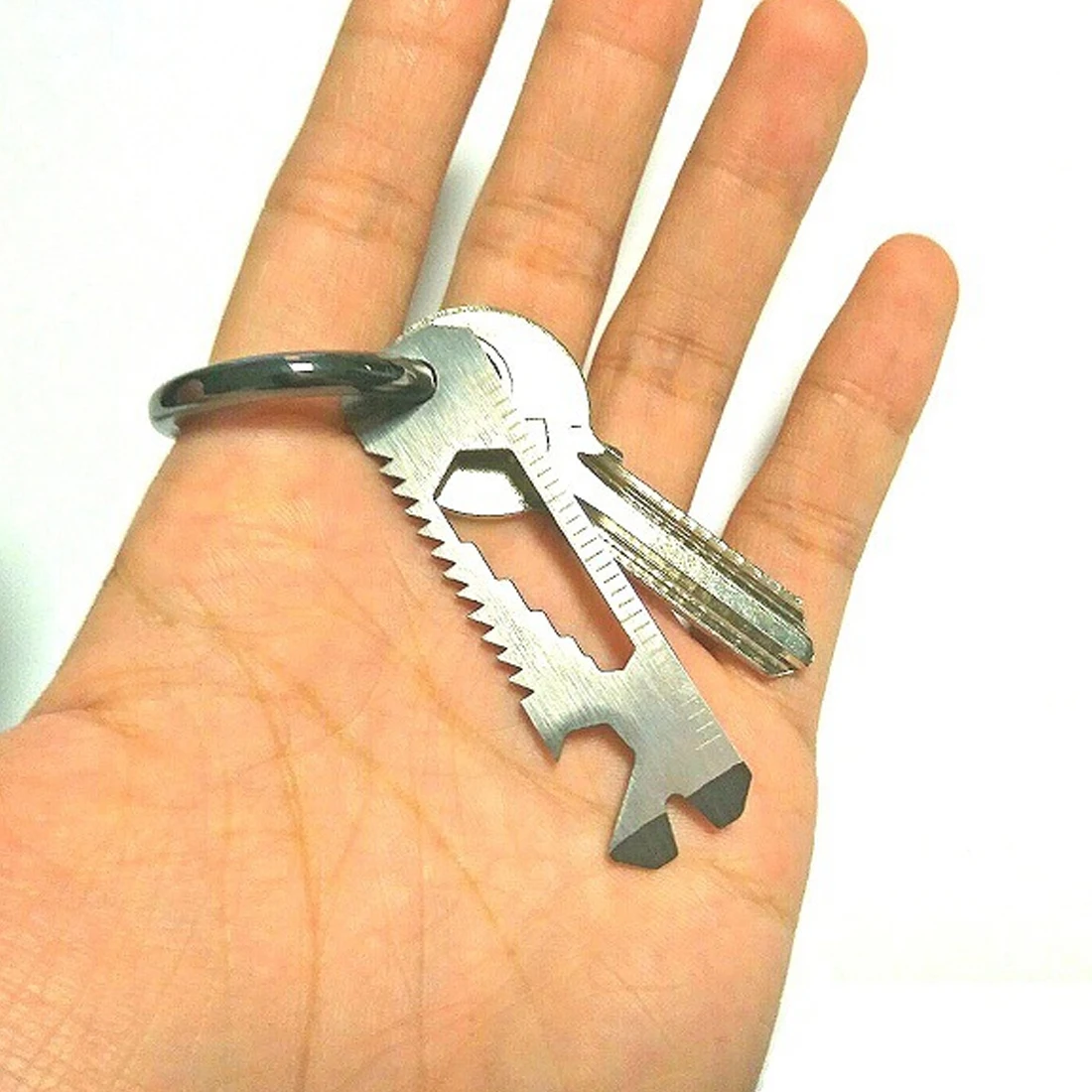 

New 6 in 1 Pocket Survival Tool Camping Screwdriver Bottle Opener Ruler Saw Keychain Outdoor Tools