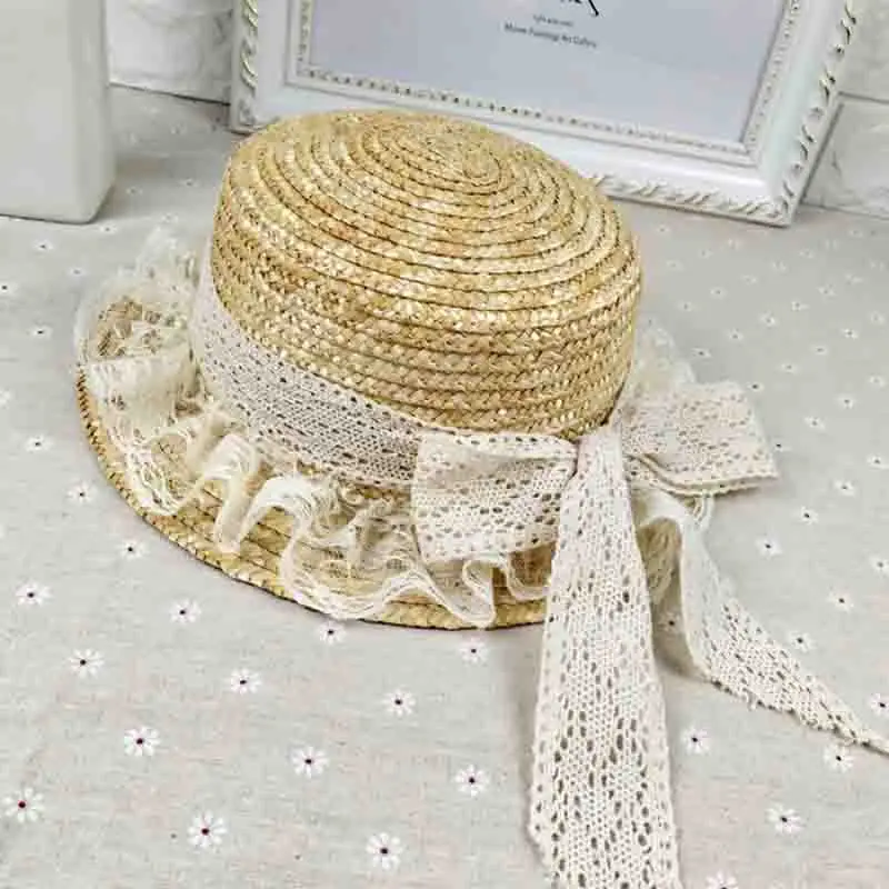 

Summer straw Fedoras fashion outdoor beach big hats lace bow caps and literary personality of the student cap free shipping