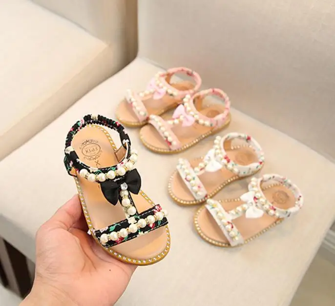 

Children Shoes Girls Sandals Pearl Bow Cut-outs Sandals Flat Open-toe School Shoes Breathable Kids Sandals Child Beach Sandals