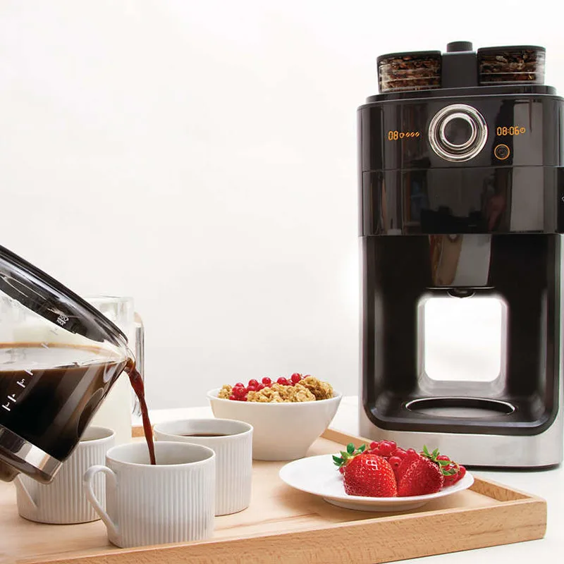 Полностью автоматическая машина для домашнего кофе в американском стиле в настоящее время используется для приготовления бобы